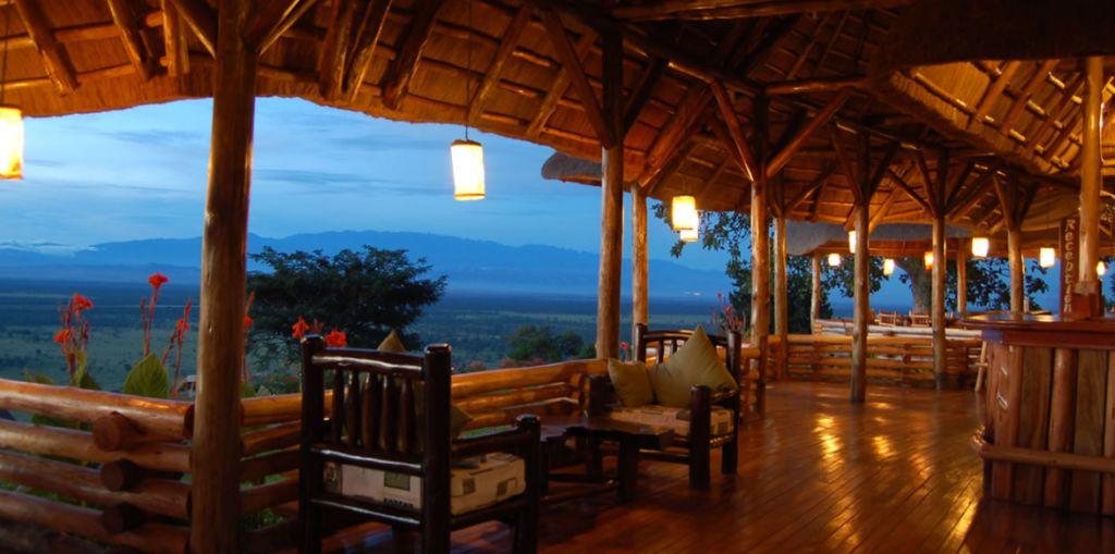 An evening view of the wilderness from the restaurant and bar lounge at Katara Lodge, Queen Elizabeth National Park.