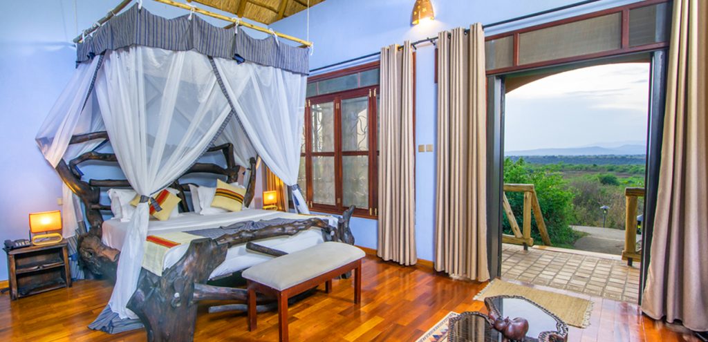 Deluxe double bedroom at Buffalo Safari Lodge, Queen Elizabeth National Park