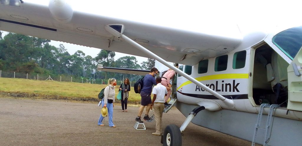 Visitors preparing to board aerolink flight for a flying safari