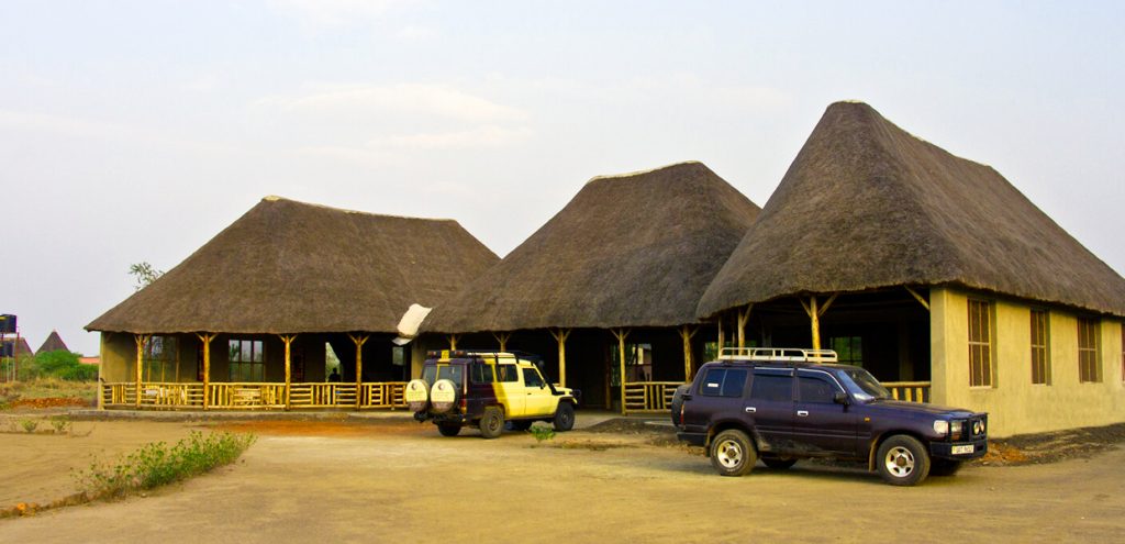 Visitors parking at the lobby and reception area at Euphorbia Safari Lodge, Queen Elizabeth National Park.